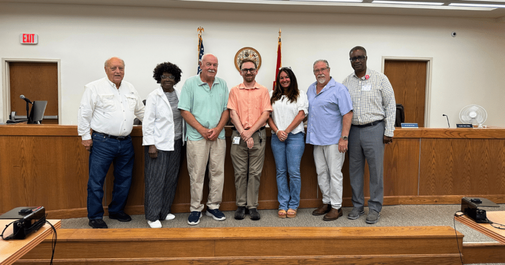 Logan Anderson is recognized as Weems Memorial Hospital's Employee of the Month by CEO David Walker and members of the Weems Memorial Hospital Governing Board.